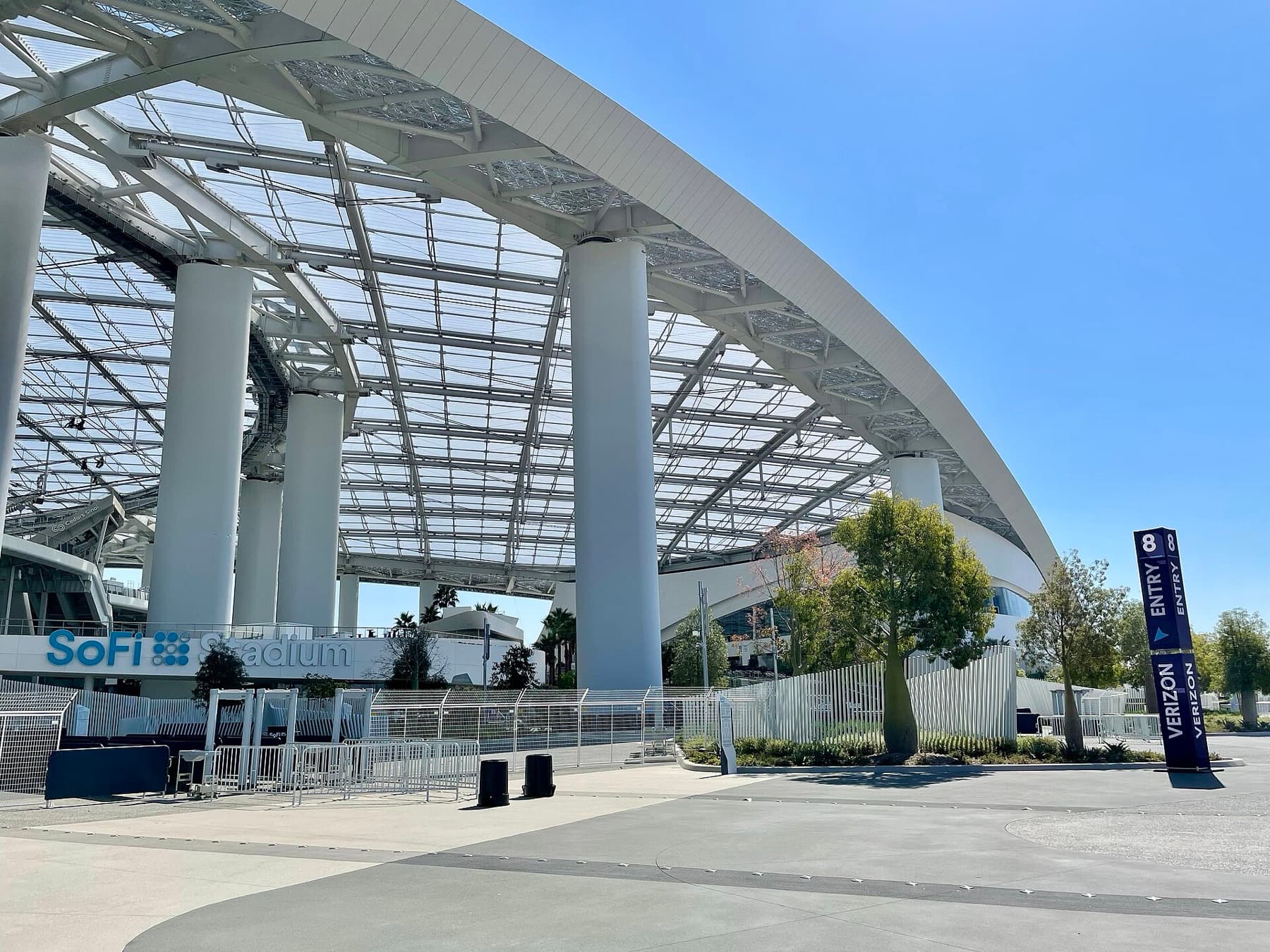 SoFi Stadium’s entrance in Inglewood — eight FIFA World Cup 2026 match nights, and in 2028 the bowl that flips to Olympic swimming.