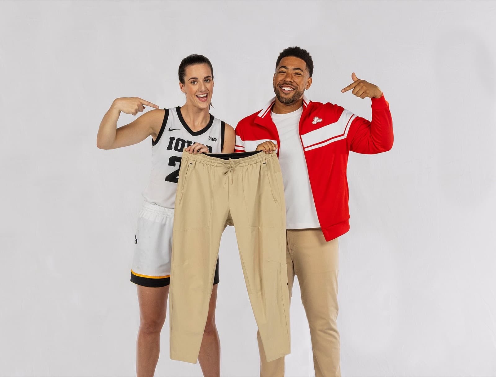 Iowa guard Caitlin Clark appears with Jake from State Farm in the company’s October 2023 announcement of its first collegiate athlete partnership.