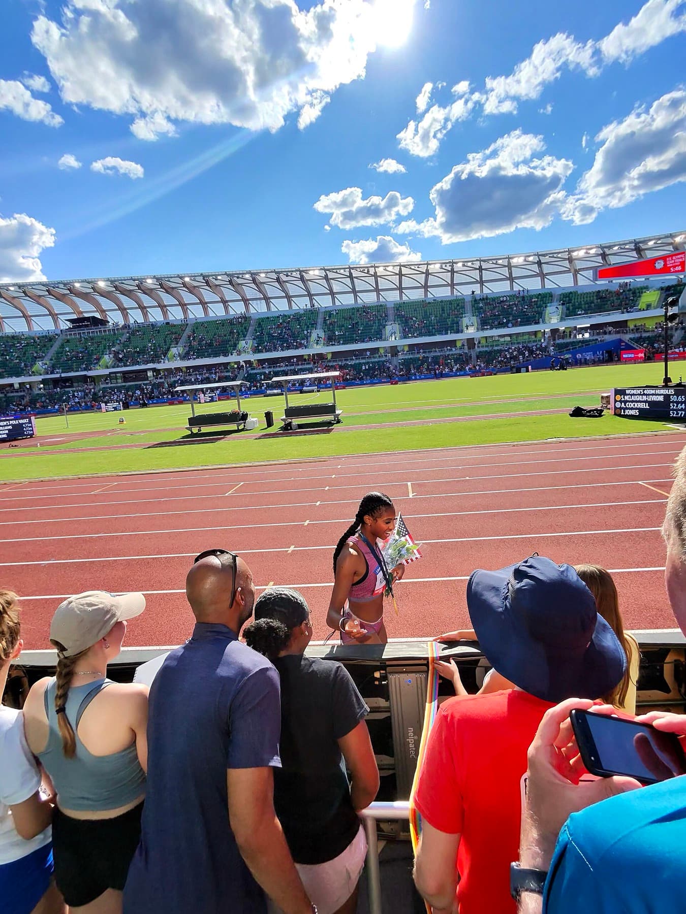 Fans greet an athlete after the women’s 400-meter hurdles at the 2024 U.S. Olympic Trials in Eugene, where Sydney McLaughlin-Levrone set a world record — the kind of selection meet families plan years around.