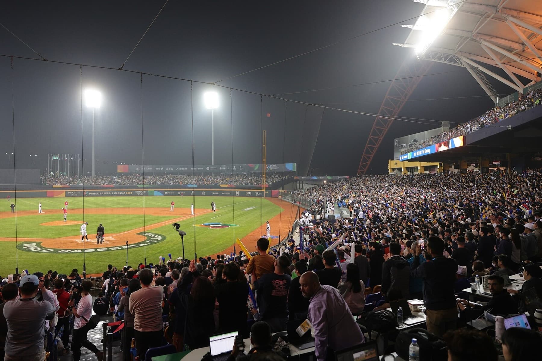 Taichung Intercontinental Baseball Stadium during a 2023 World Baseball Classic Pool A game — the same venue that hosted the inaugural World Collegiate Baseball Championship in July 2026.