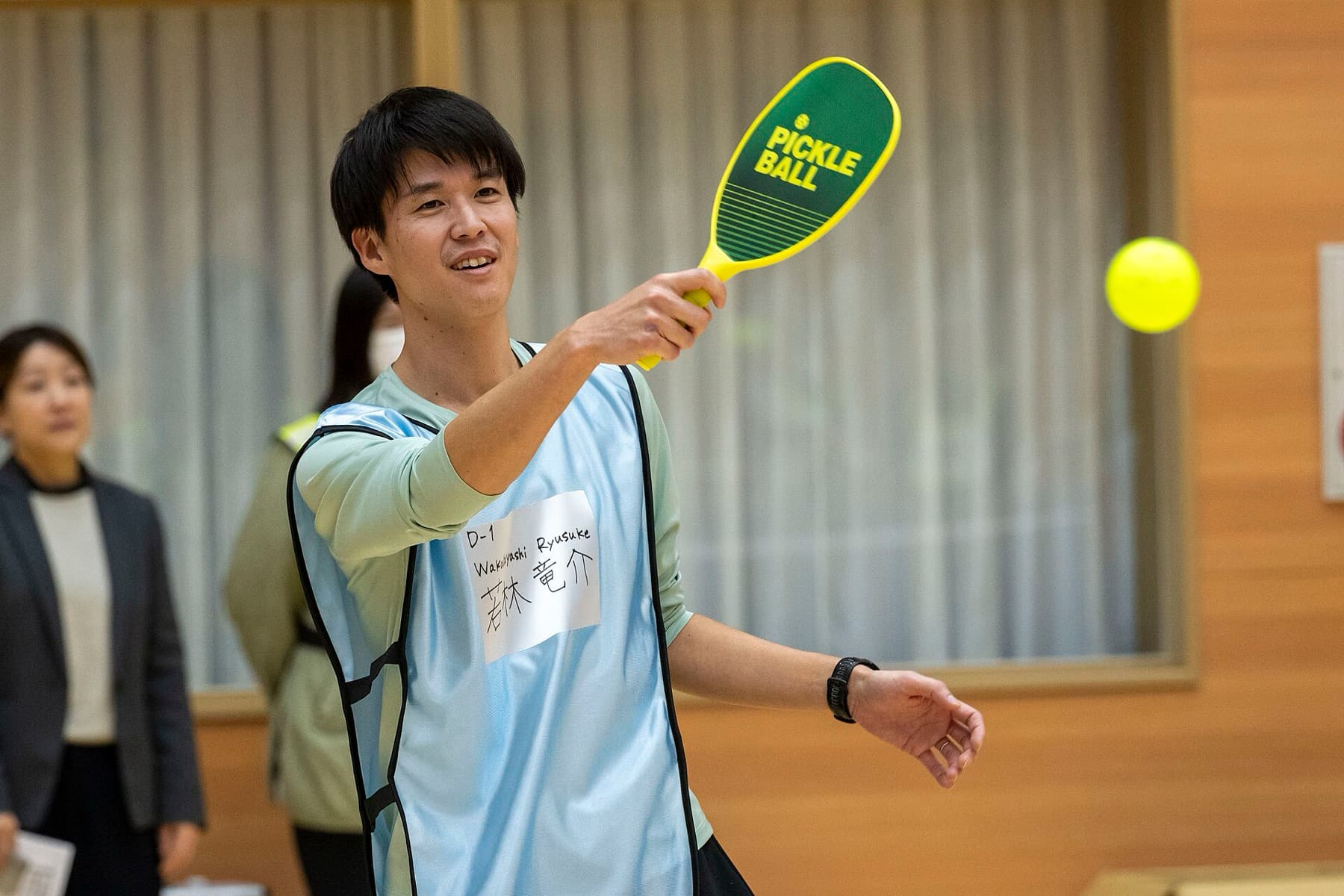 Wakabayashi Ryusuke mid-rally during a Japan–U.S. pickleball exchange in Misawa in December 2025. Japan’s two federations merged the following spring as the sport’s Asian growth rates pulled away from everywhere else.