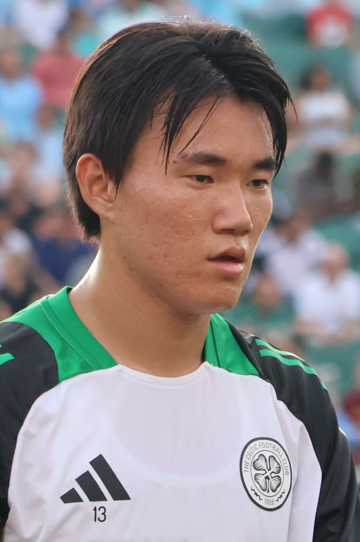 Yang Hyun-jun in Celtic’s white training kit during a July 2024 open practice in Cary, North Carolina — Korea’s World Cup wildcard and Europe-based face of the Asian Games gold chase.