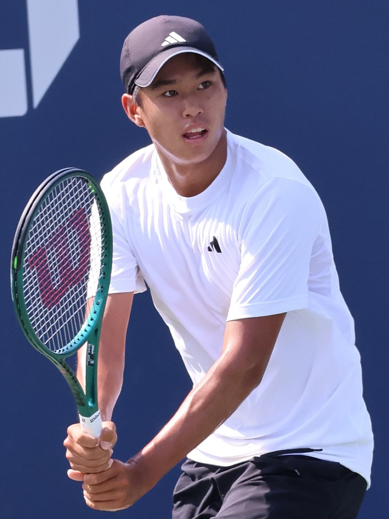 Learner Tien at practice ahead of the 2024 US Open — the home Slam where he finally won a main-draw match in 2026 before falling in the fourth round.
