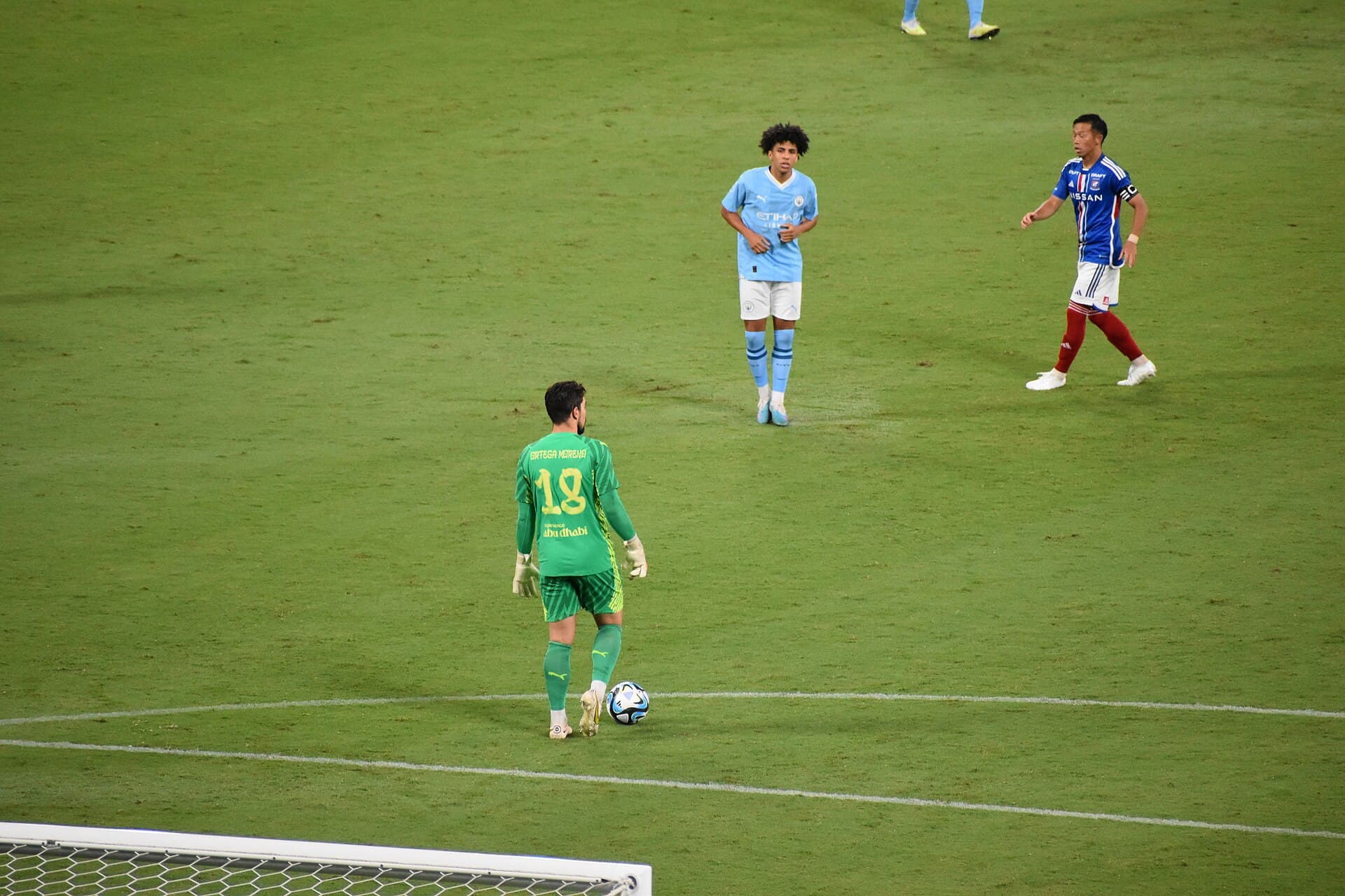 Manchester City’s Rico Lewis and goalkeeper Stefan Ortega during the club’s 2023 Asia tour friendly against Yokohama F. Marinos at Japan National Stadium. City’s 2026 route returns to Hong Kong and Seoul.