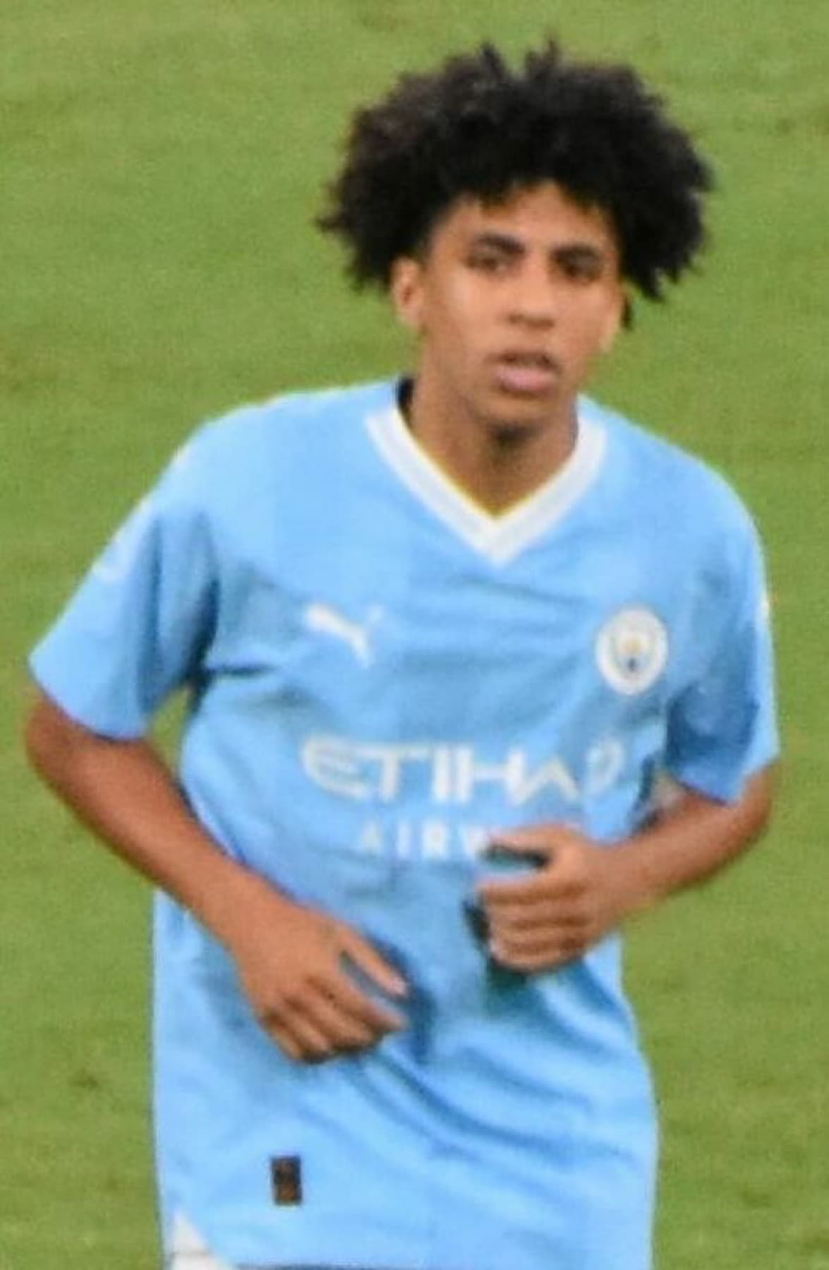 Manchester City’s Rico Lewis and goalkeeper Stefan Ortega during the club’s 2023 Asia tour friendly against Yokohama F. Marinos at Japan National Stadium. City’s 2026 route returns to Hong Kong and Seoul.