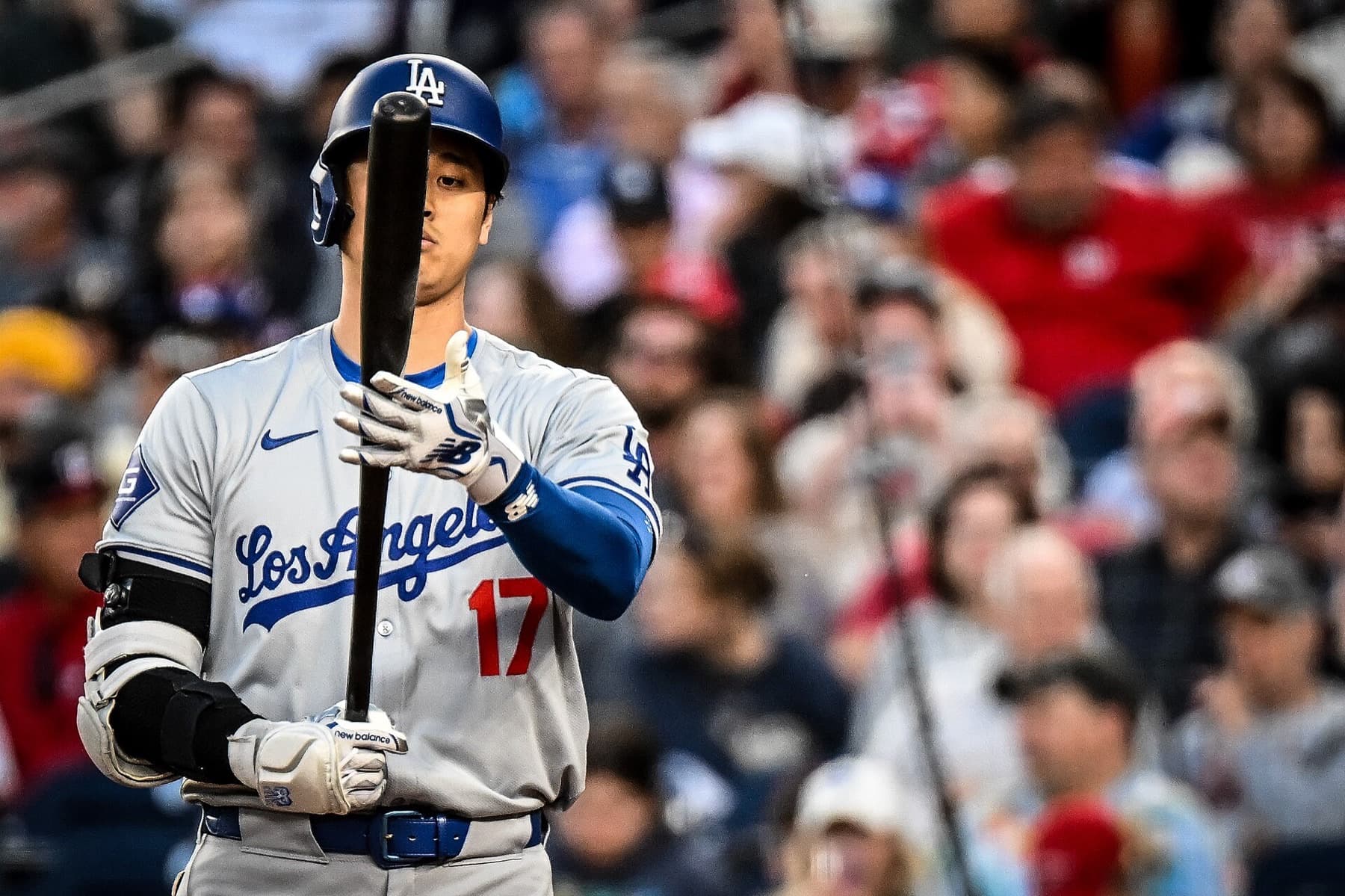 Shohei Ohtani with bat in hand for the Dodgers at Nationals Park on April 24, 2024 — the swing that still works while his pitching calendar waits.