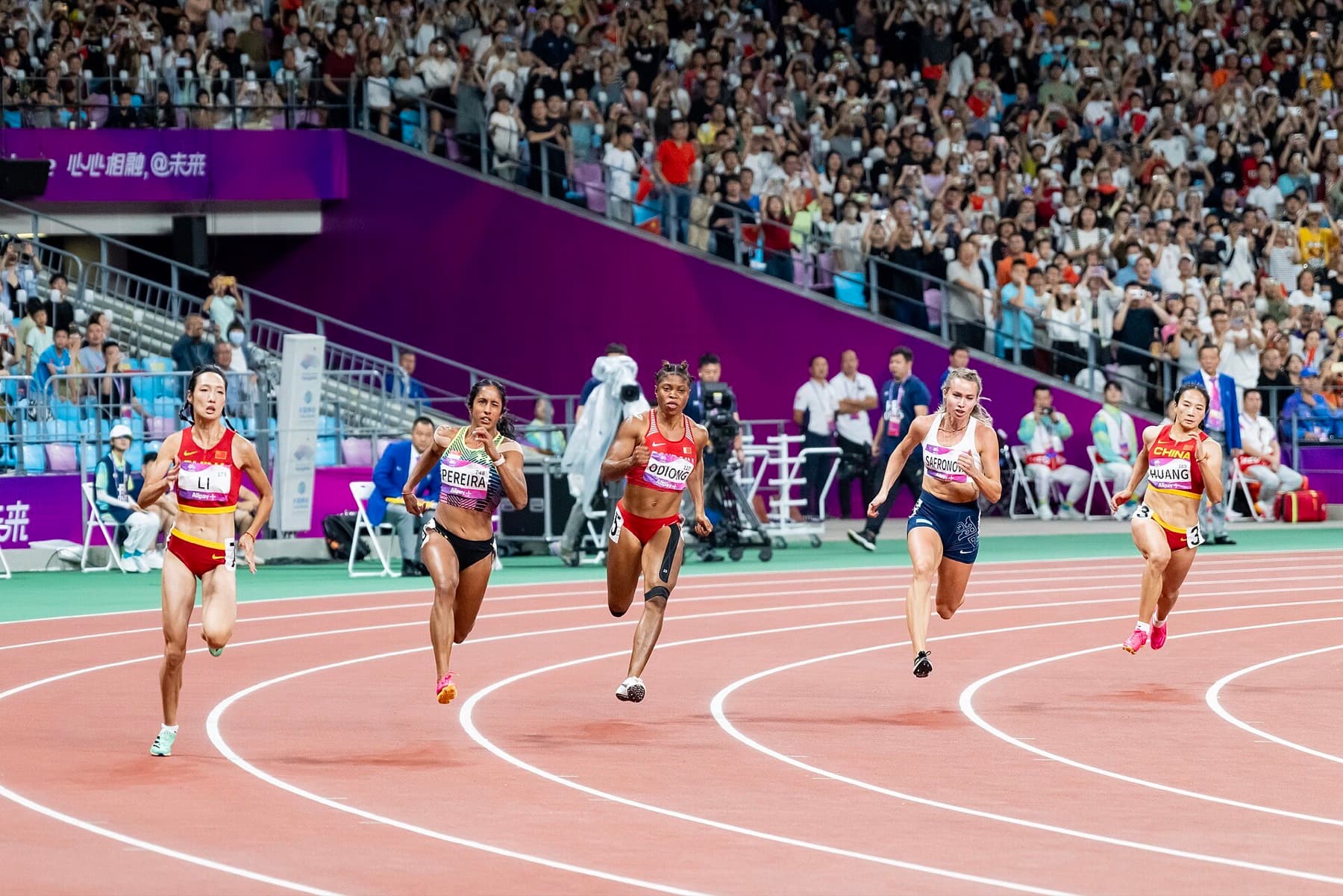 Shanti Pereira in the Hangzhou 200 metres final on Oct. 2, 2023, the race she won in 23.03. Sunday's gold in Nagoya made her the first woman to keep the title.