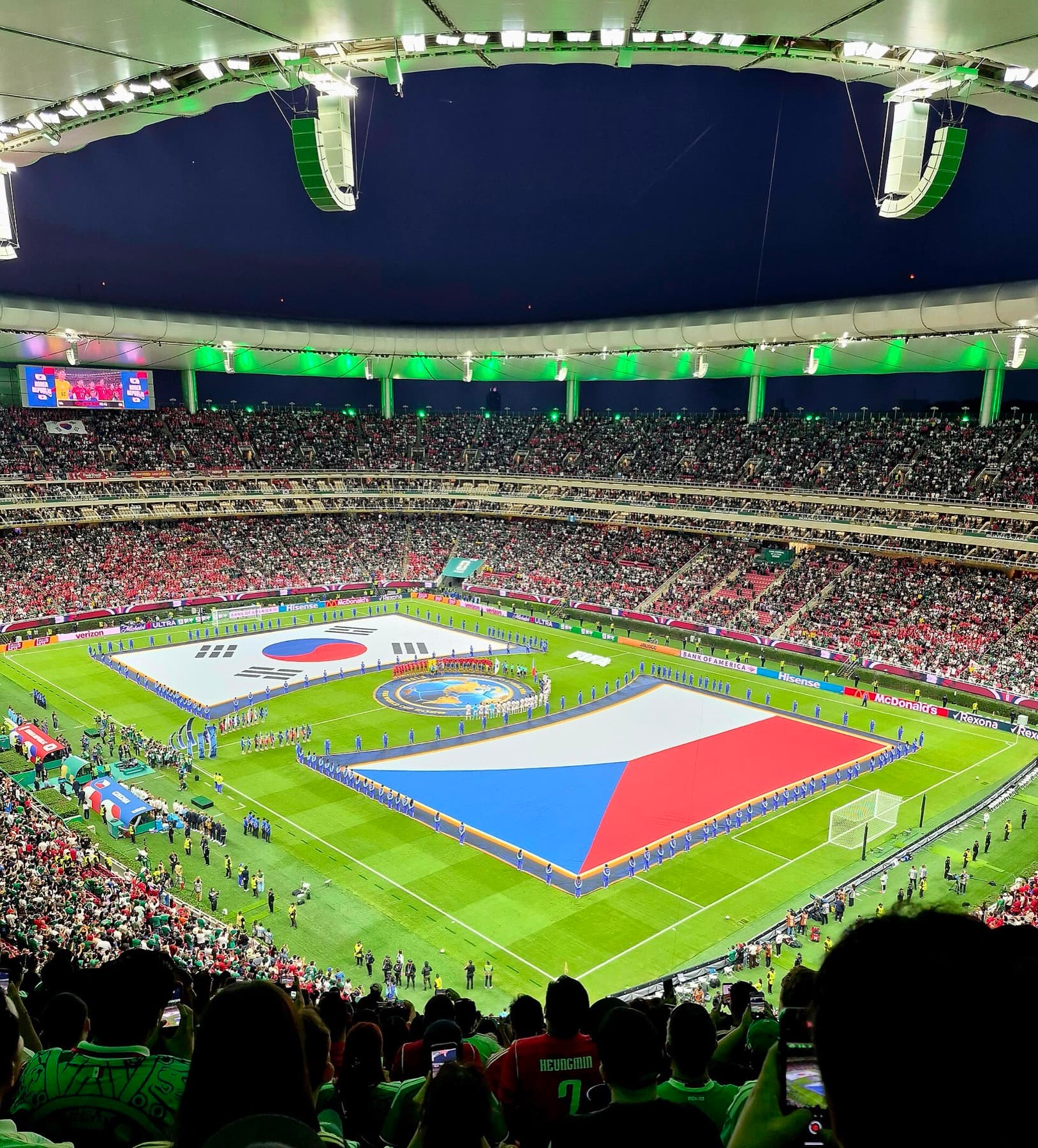 Flags of South Korea and Czechia on the pitch before their Group A opener at Guadalajara Stadium. Korea came from behind to win 2–1, then lost the next two matches 1–0 and missed the knockout wild card.