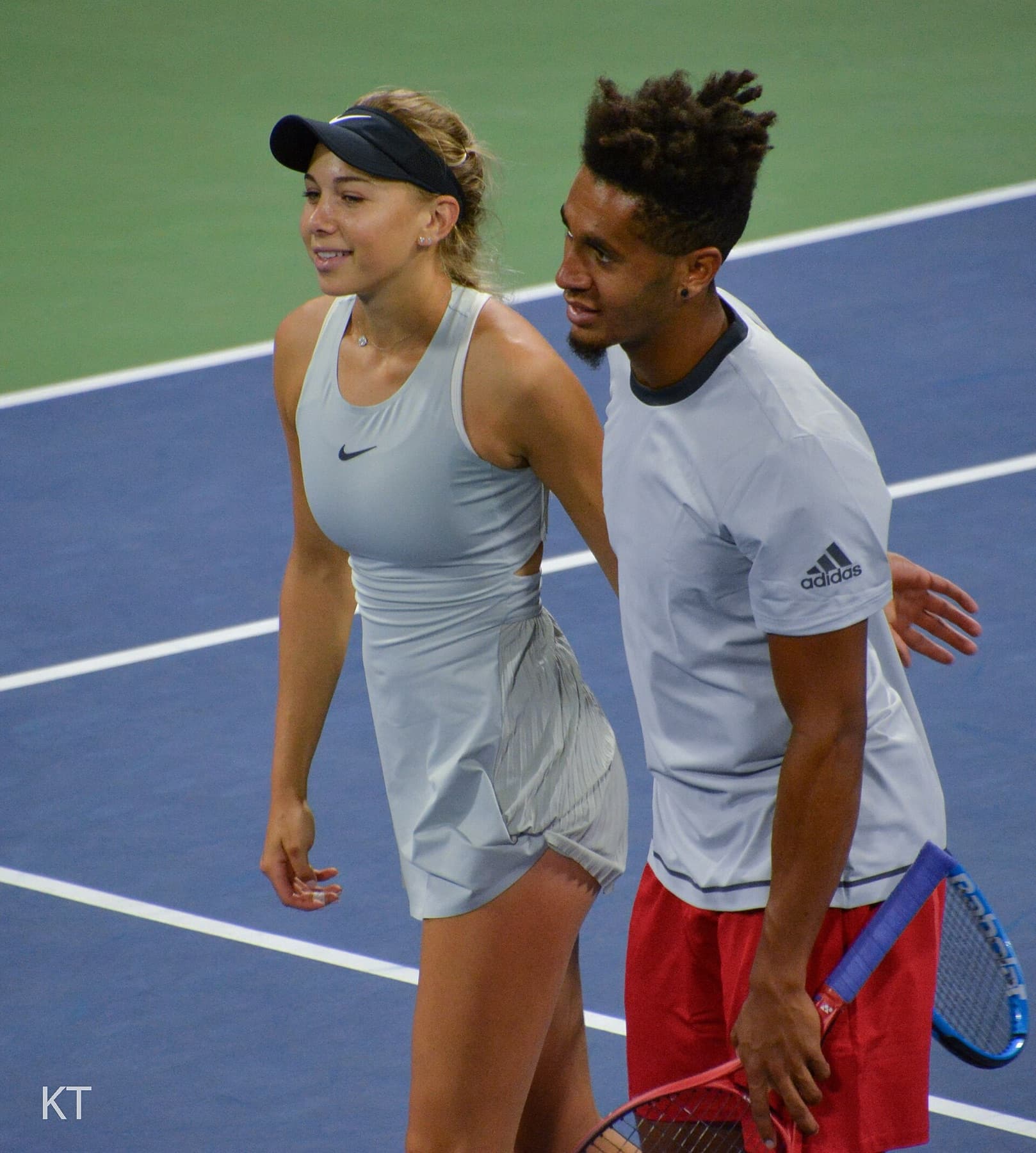 Amanda Anisimova and Michael Mmoh during a US Open mixed doubles match in 2018, when the event still ran inside the singles fortnight. Anisimova is back in the mixed draw this week as the No. 3 seed alongside Learner Tien.