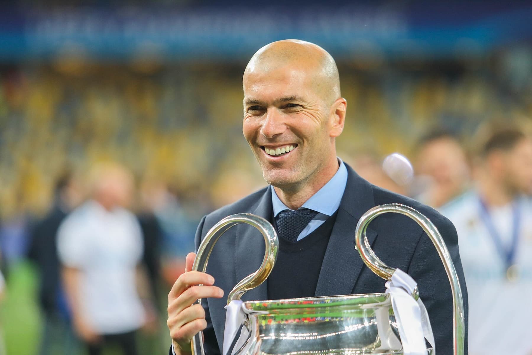Zinedine Zidane with the Champions League trophy after Real Madrid’s final win in Kyiv on May 26, 2018 — the coaching résumé Asia already knew before Tuesday’s France job.